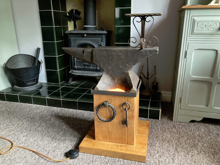 A stand for an anvil with an uplight built in, made on commission for a customer on Commission 